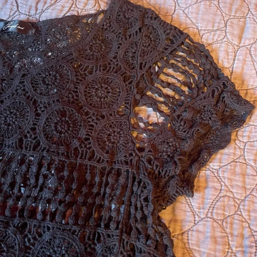 Sample text black crochet cropped top